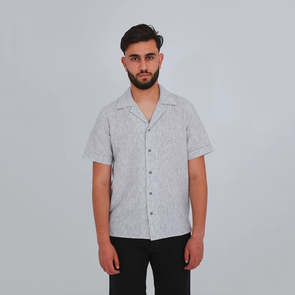 CHEMISE COL OUVERT A RAYURES — Bleu