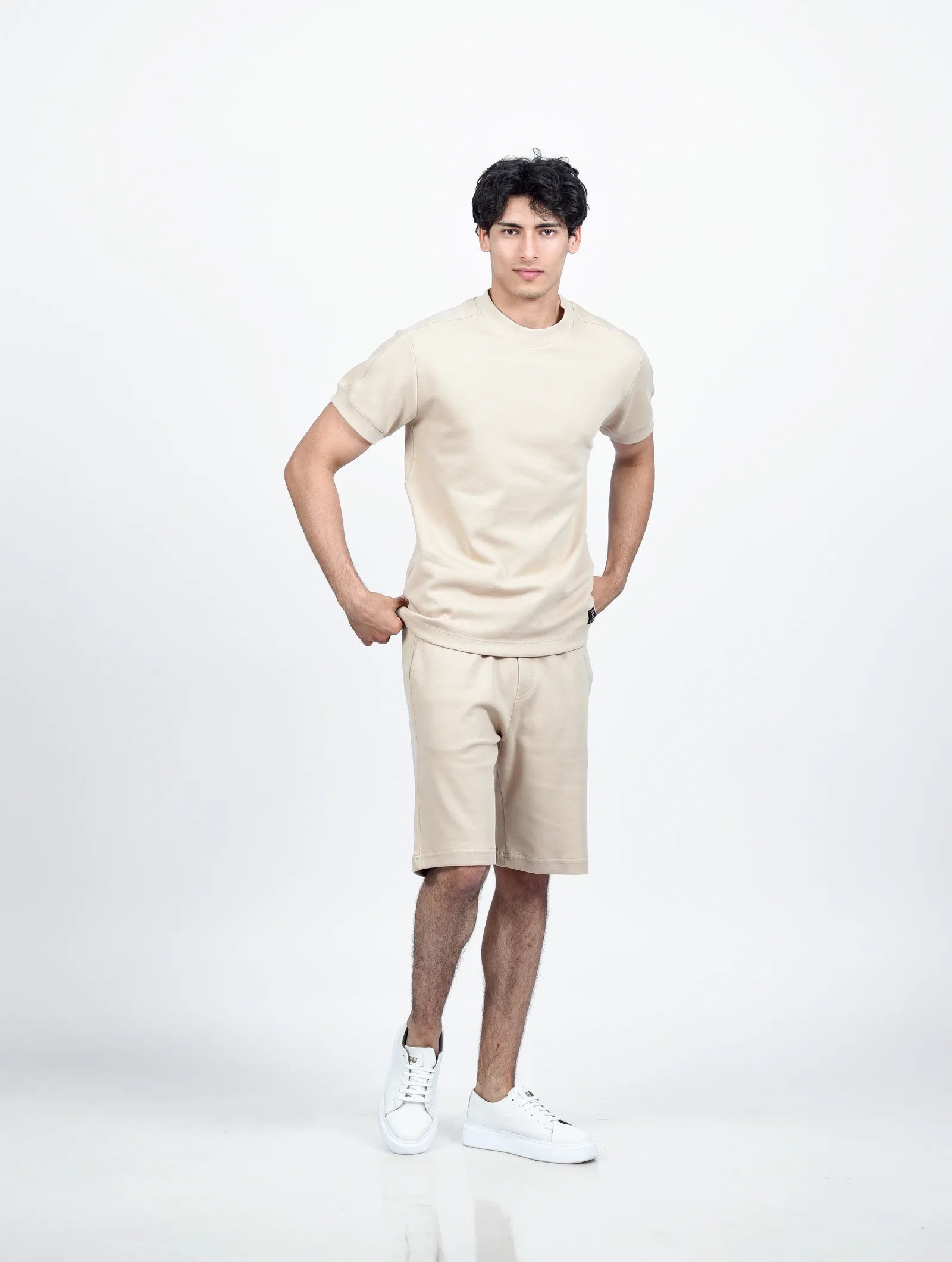 SHORT PIQUE AVEC POCHE EN DOS