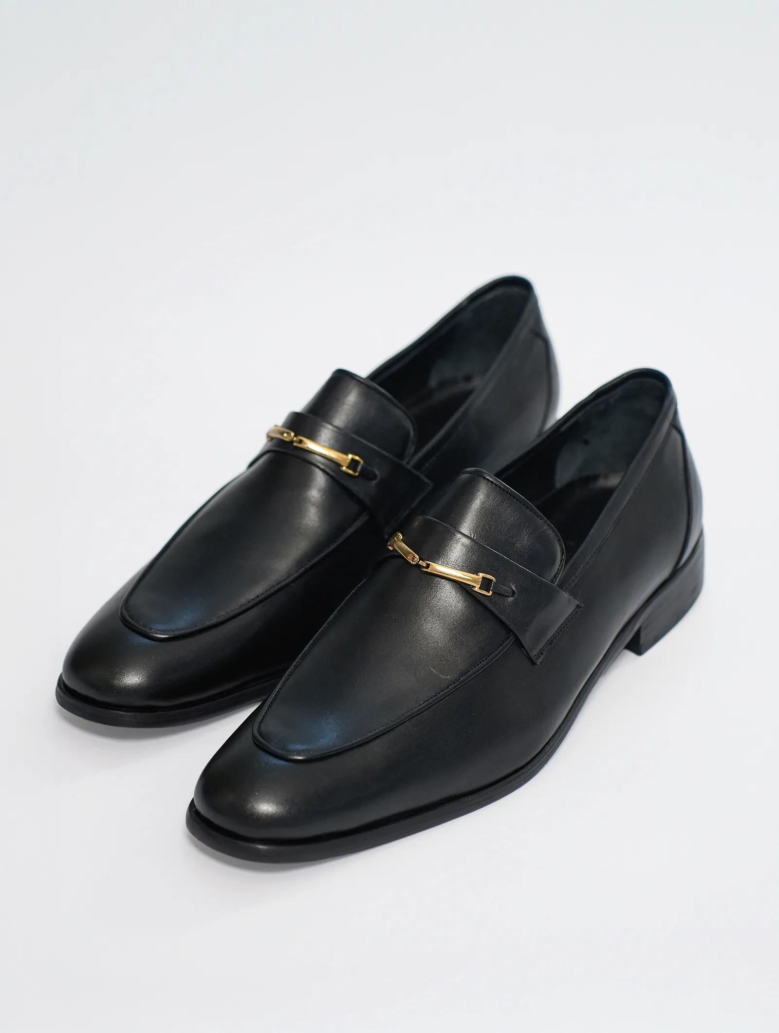 CHAUSSURE AVEC BOUCLE