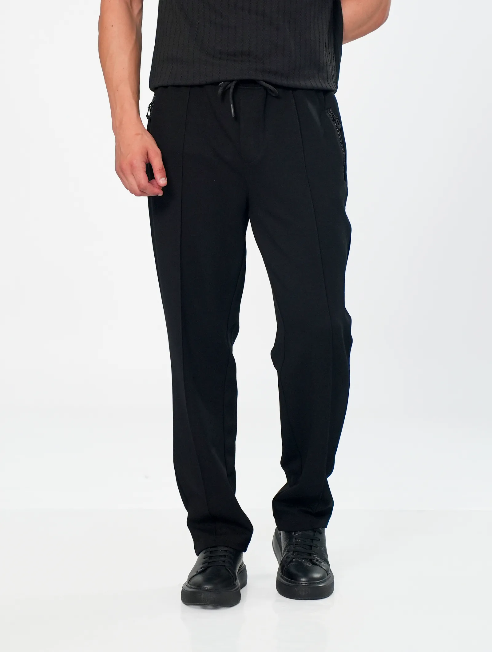PANTALON JOGG AVEC ZIP CONTASTE DE DEUX COTE